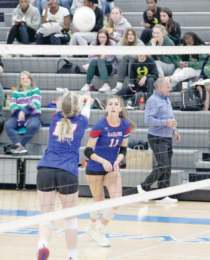 SECOND-RANKED Cleveland opened the tSSAA State Volleyball Championships with a resounding sweep of Houston Tuesday as junior setter Kinslee McGowan (17) handed out 53 assists and sophomore spiker Lauren Hurst (11) slammed home 31 kills.