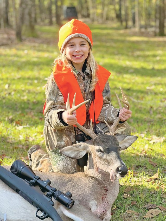HARVESTING HER first deers, Josalynn Martin, age 9, shot a spike on Oct. 29 in Bradley County, then bagged this 10-point buck Nov. 12, while hunting in Alabama. This is Josalynn's first year deer hunting. She is the daughter of Johnathan and Jennifer Martin and  attends Park View Elementary School.