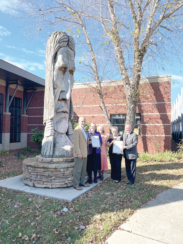 FROM LEFT, Bradley County Mayor D. Gary Davis; Ocoee Chapter Regent Leigh Ann Boyd; Ocoee Chapter American Indians Committee Chair Patricia Rife-Beavers; Chestuee Chapter Regent Anita Green; and Cleveland Mayor Kevin Brooks stand in front of the &ldquo;Cherokee Chieftain&rdquo; statue in front of the Museum &amp; Cultural Center at 5ive Points.