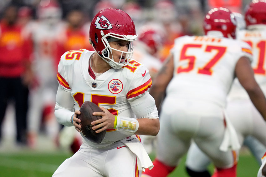 KANSAS CITY Chiefs'  Patrick Mahomes drops back to pass during the first half of an NFL is the oldest starter at 27 in the AFC Playoffs, which begin this weekend.