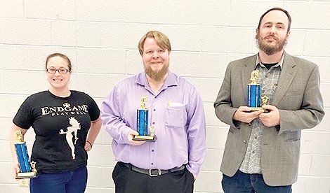 ADULT winners in the 25th annual Bradley County Chess Championship, from left, are Liz Dyer, first place; Miles Jorgenson, second place; and David Johnson, third place.