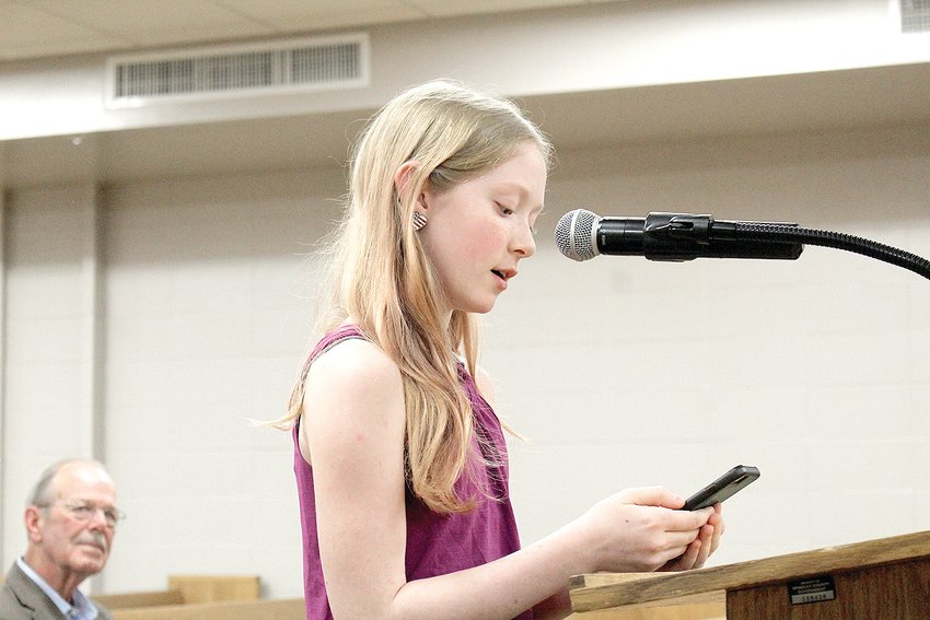 10-YEAR-OLD Layelle Madison, daughter of Lindsey Madison, spoke during communication from the audience at the Bradley County Commission's Monday, Feb. 27, work session. Expressing her support of communication from the audience, she quoted President Harry S. Truman, saying, &quot;Once a government is committed to the principle of silencing the voice of opposition, it has only one way to go, and that is down the path of increasingly repressive measures, until it becomes a source of terror to all its citizens and creates a country where everyone lives in fear.&quot;