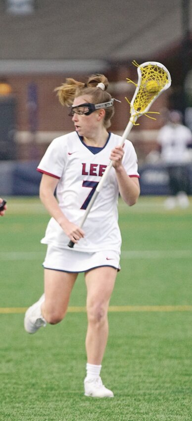 LADY FLAMES Maggie Luzier scored four goals in Sunday's showdown with No. 15 Flagler.