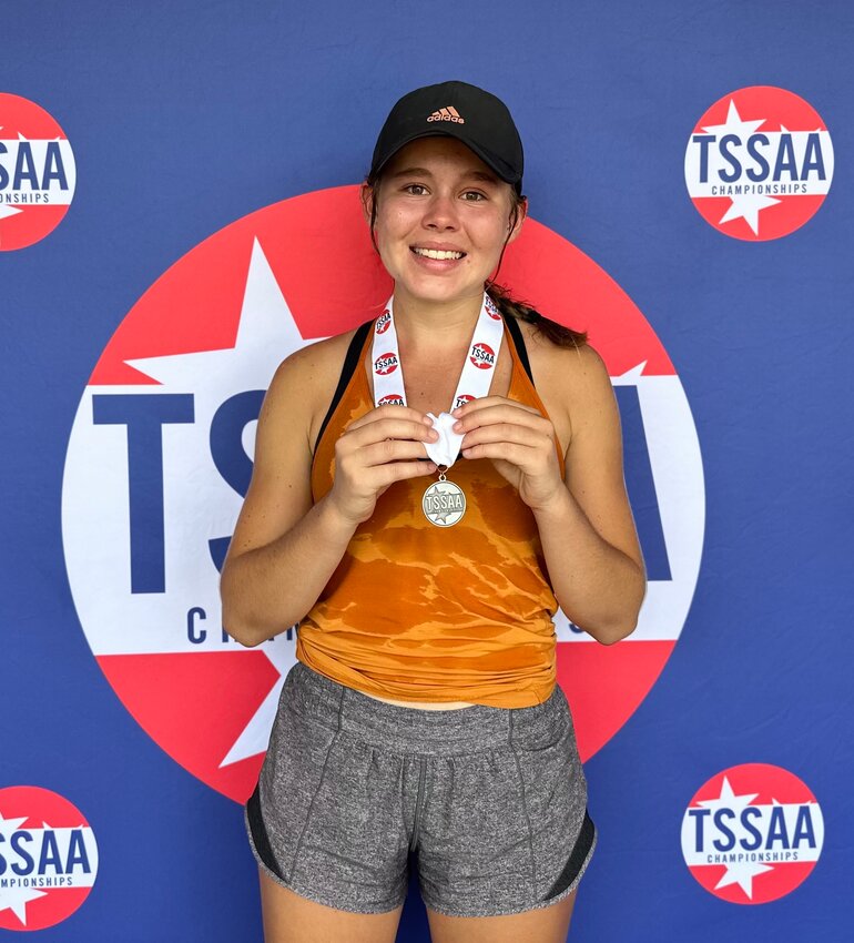 LADY MUSTANG junior Ensley Collins shows off her TSSAA State Singles runner-up medal after finishing play at the Spring Fling Friday in Murfreesboro.