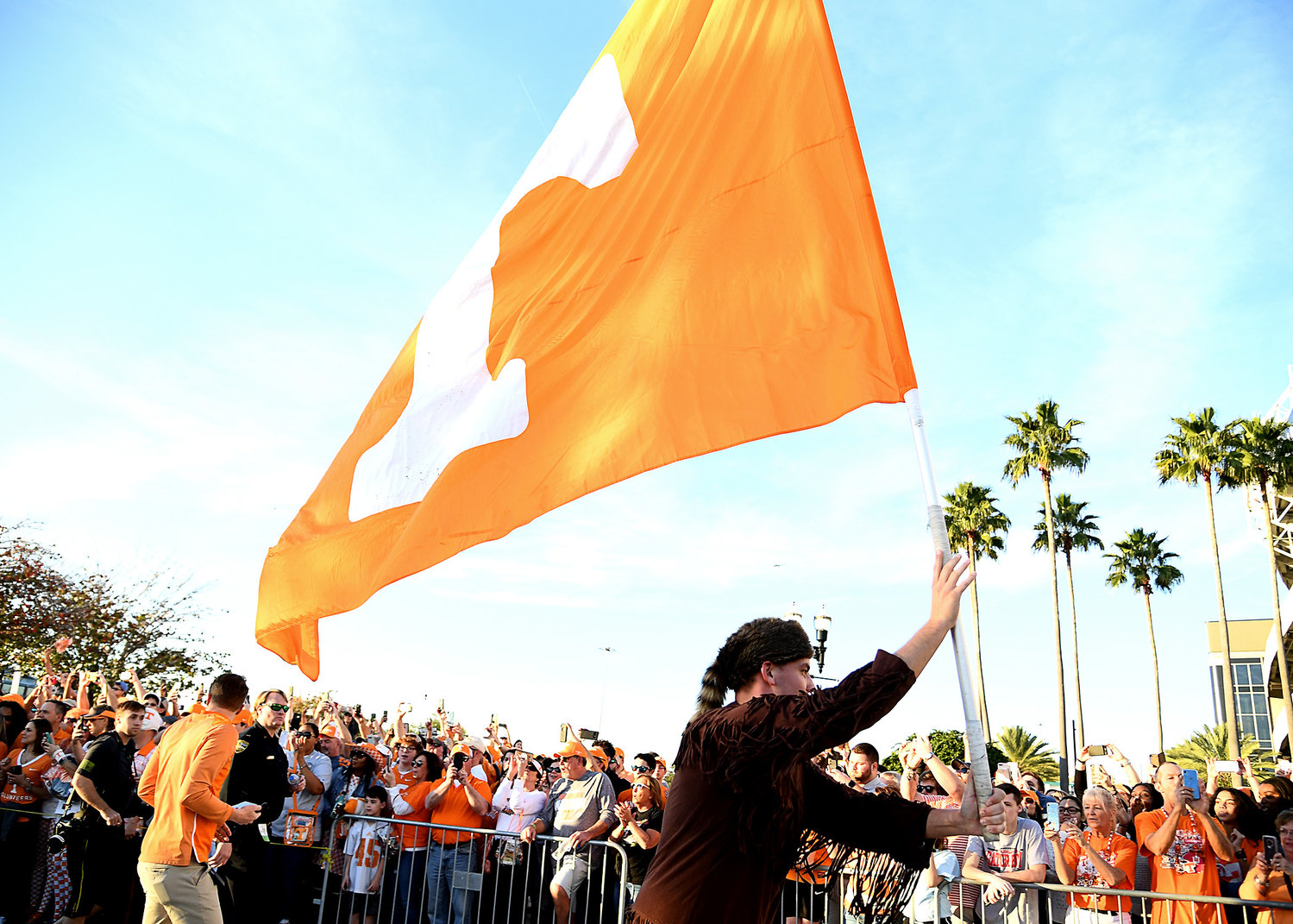 Tennessee Volunteers fans greet players and coaches as they arrive at TIAA Bank Field for the Gator Bowl NCAA football game against the Indiana Hoosiers Thursday, Jan. 2, 2020.