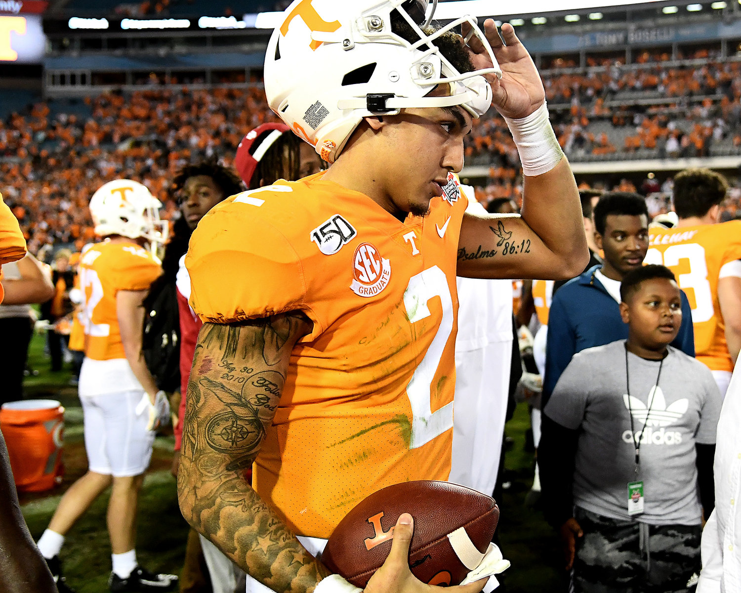 Tennessee Volunteers quarterback Jarrett Guarantano (2) carries the game ball following the Vols win over the Indiana Hoosiers in the Gator Bowl Thursday, January 2, 2020, at TIAA Bank Field in Jacksonville, Fla.