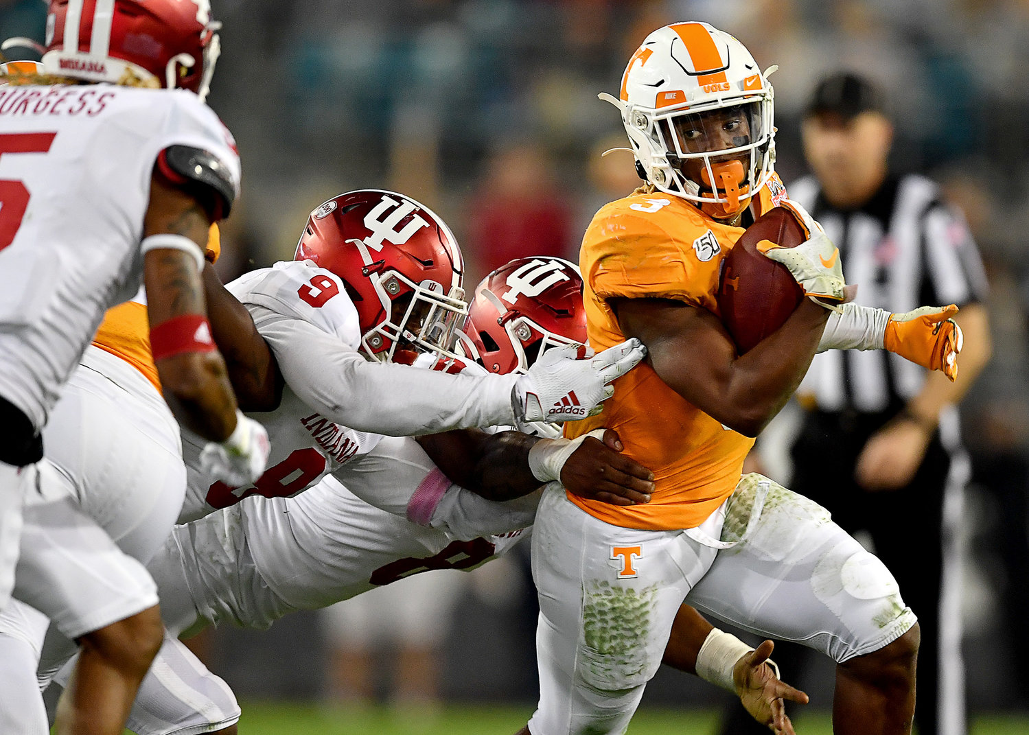 Tennessee Volunteers running back Eric Gray (3) eyes the defense on a run in the second half of the Gator Bowl NCAA football game against the Indiana Hoosiers Thursday, January 2, 2020, at TIAA Bank Field in Jacksonville, Fla.