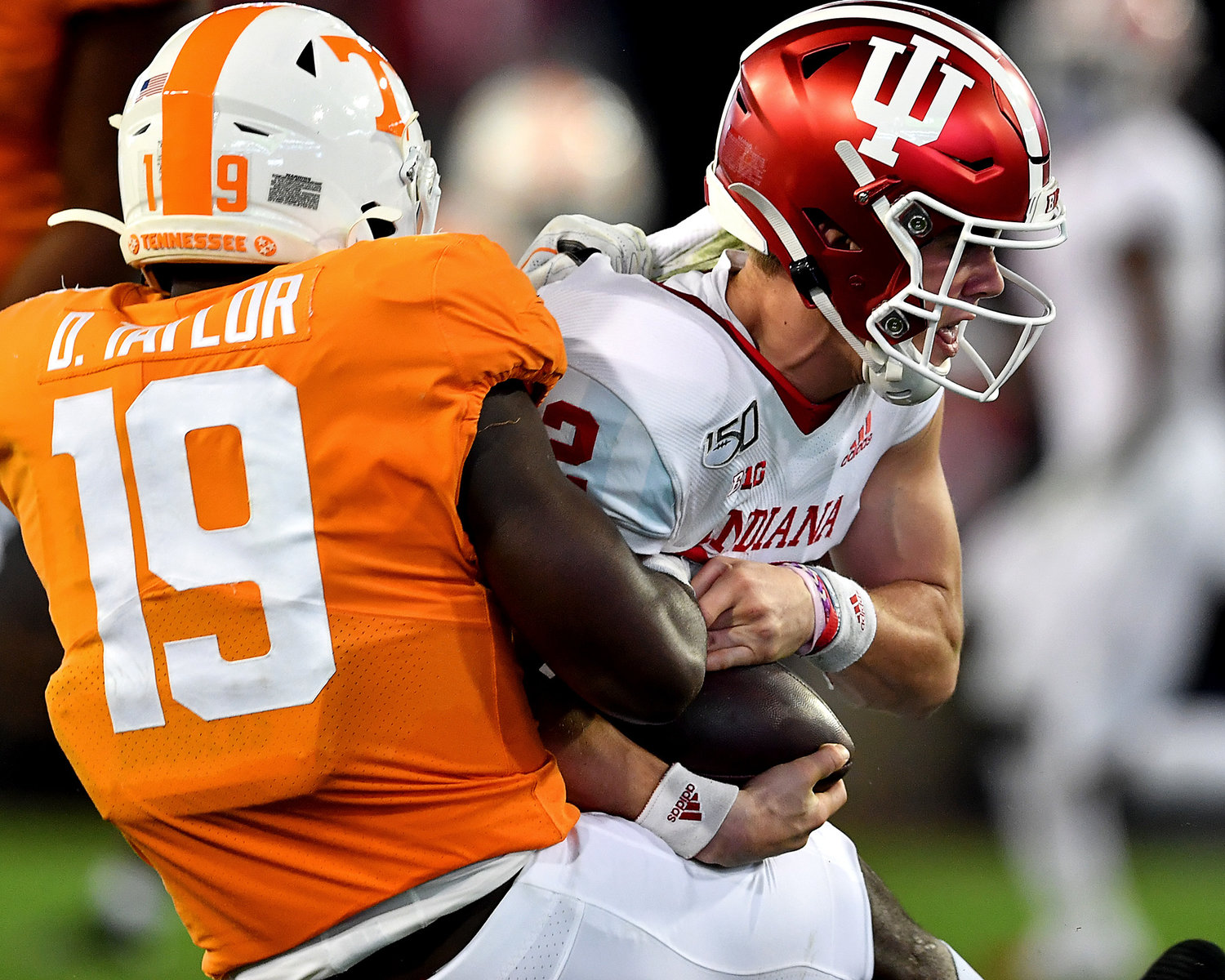Tennessee Volunteers linebacker Darrell Taylor (19) sacks Indiana Hoosiers quarterback Peyton Ramsey (12) in the first half of the Gator Bowl NCAA football game Thursday, January 2, 2020, at TIAA Bank Field in Jacksonville, Fla.