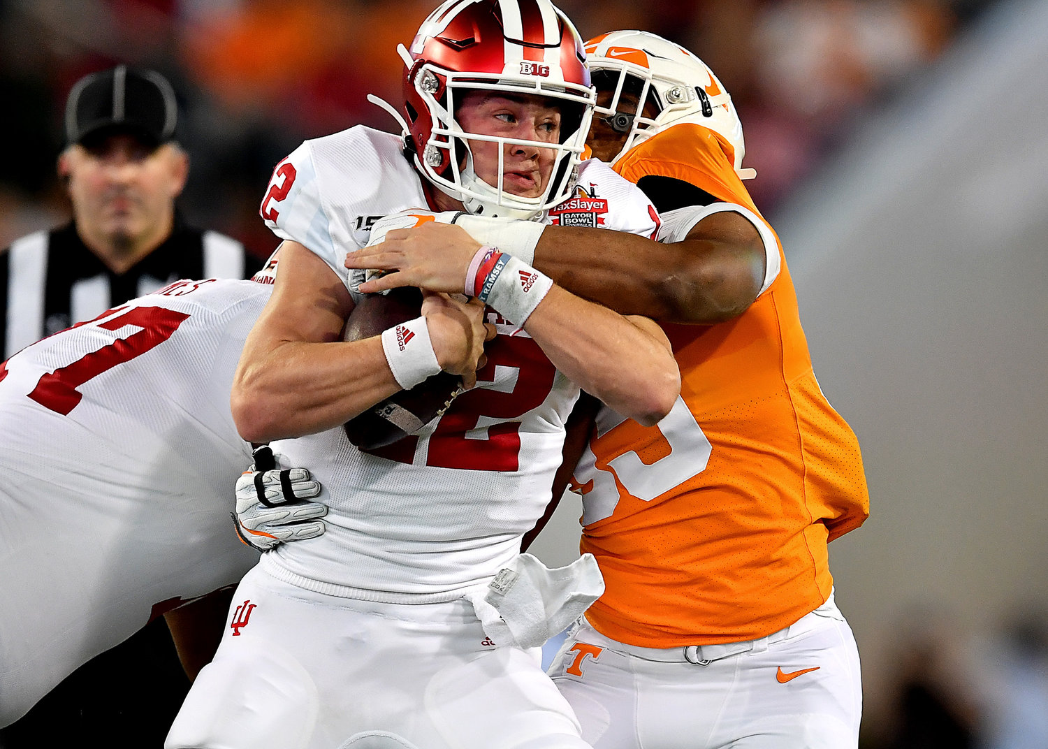 Indiana Hoosiers quarterback Peyton Ramsey (12) prepares himself to be sacked in the first half of the Gator Bowl NCAA football game against the Tennessee Volunteers Thursday, January 2, 2020, at TIAA Bank Field in Jacksonville, Fla.