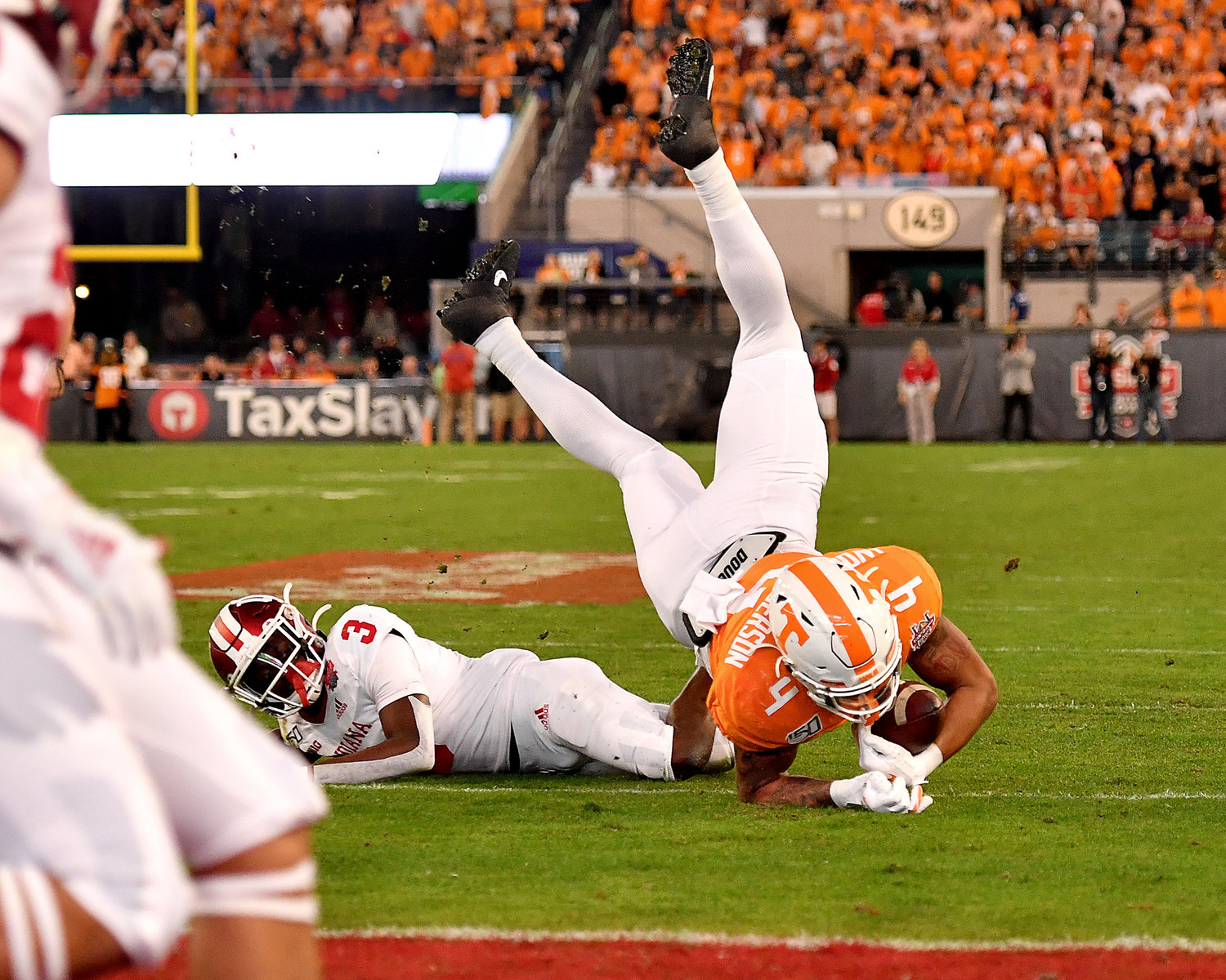 Tennessee Volunteers tight end Dominick Wood-Anderson (4) is upended after making a catch during the first half of the Gator Bowl NCAA football game against the Indiana Hoosiers Thursday, January 2, 2020, at TIAA Bank Field in Jacksonville, Fla.