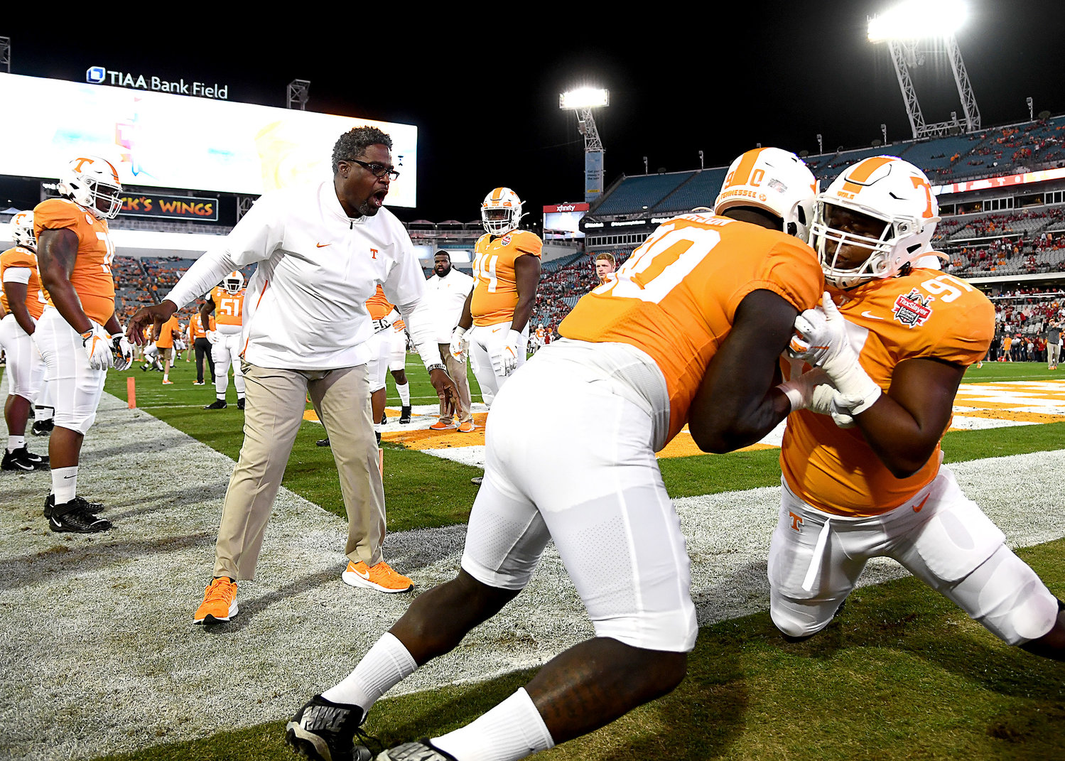 Tennessee Volunteers defensive line coach, Tracy Rocker, warms up players prior to the start of the Gator Bowl NCAA football game against the Indiana Hoosiers Thursday, January 2, 2020, at TIAA Bank Field in Jacksonville, Fla.