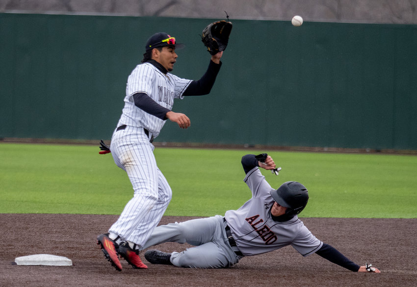 Trace Mazon steals second base during the fifth inning of the Bearcats 2-1 win over Arlington Martin on Saturday, Feb. 25. Mazon later scored the winning run on a double by Andrew Cambre.
