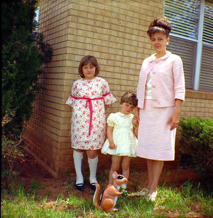 Outside the parsonage at Bessie, Oklahoma, Katie Schultz (31) is shown with her daughters. Tiny Lori was named after Lore Bäethke, one of Katie's German playmates, whose family fled and escaped from the Russian army during World War II.
