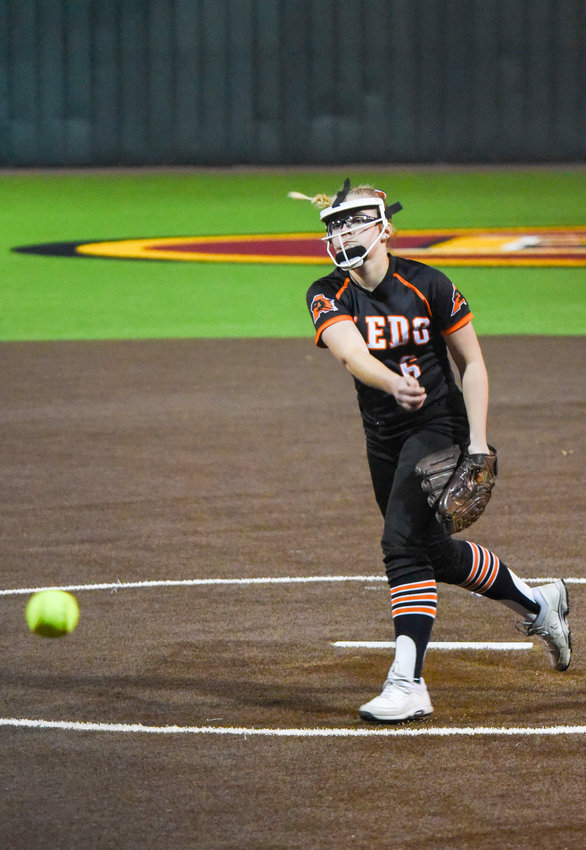 Taylor McKean takes the field against Saginaw High School Friday night to pitch for the Ladycats. The Ladycats shutout the Rough Riders 14-0.