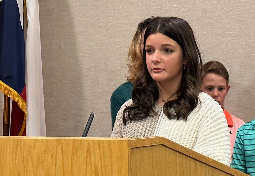 Abigail Myser spoke of her experience with Speak Up, Speak Out (SUSO). "SUSO is a community civics program that allows a group of students to identify community issue and create presentation to solve the issue," she said.