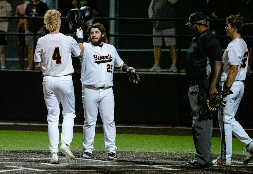 Brooks Dwinell and Andrew Cambre celebrate Dwinell's walk-off home run in the bottom of the fifth inning. Aledo earned a run-rule victory over Granbury on Friday, March 31.