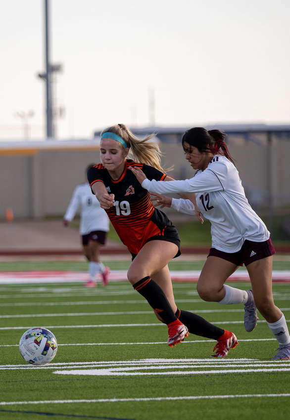 Saddie Smith works against a Northside player during bi-district action.