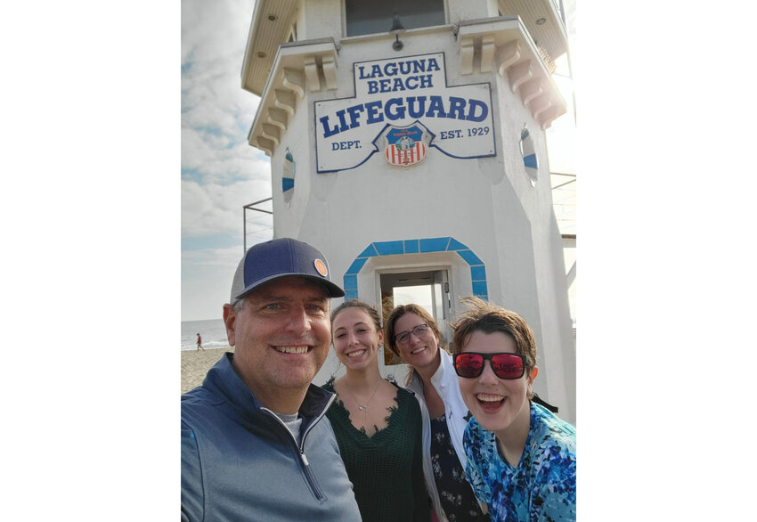 Chris Davis, Elena Aresi, Gina Davis, and Alex Davis are shown at Laguna Beach, California. They got in the Pacific Ocean in October.