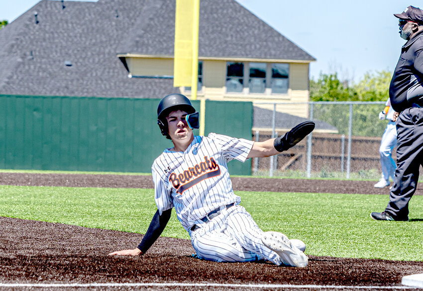 Boyd Thompson slides into third during Aledo's 4-1 win over Wichita Falls Rider in the season finale on Saturday, April 29.