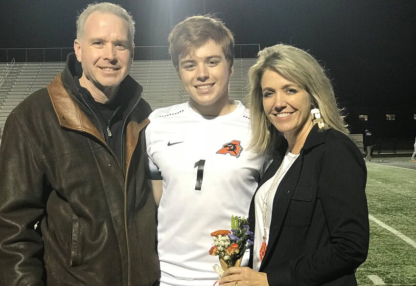 Lance and Julie Turner with their son Will, a 2018 Aledo High graduate who played football and soccer and is graduating from Texas Tech this summer.