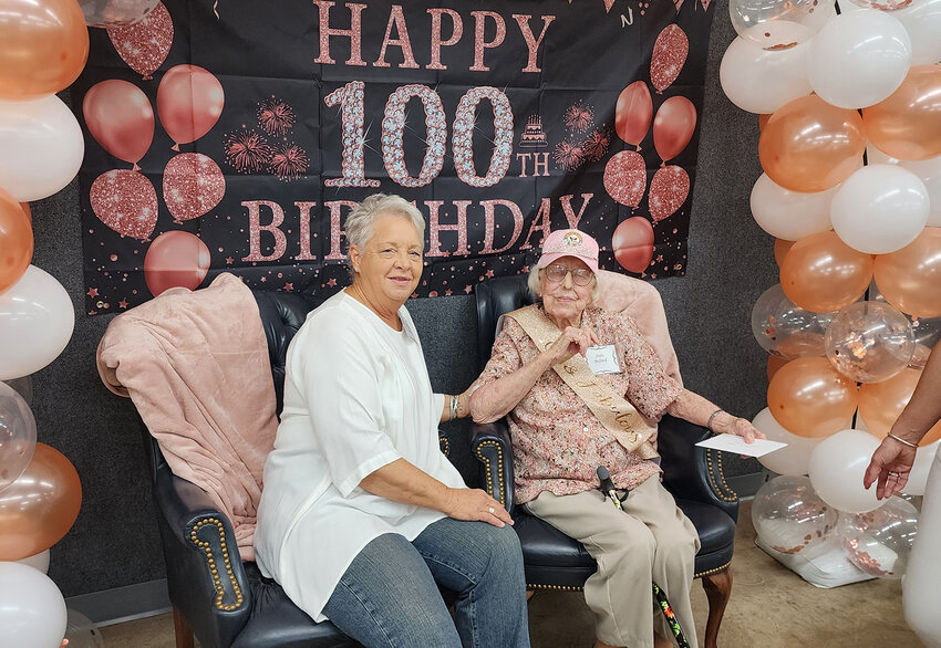 Jo Saunders is one of many friends who had her photograph taken with Jean Buford, who celebrated turning 100 on May 11.