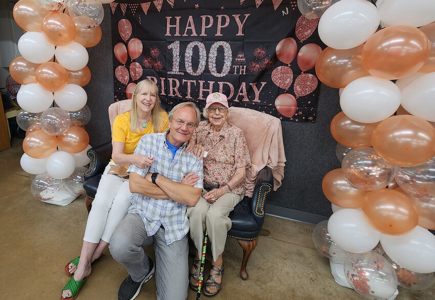 Jean Buford celebrates her 100th birthday with daughter Annie Stephenson and son-in-law J.D. Stephenson.