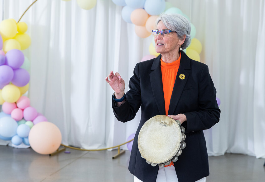 Lynn McKinney is shown with a tambourine gifted to her – she has previously joked that when she was younger, she wanted to play the tambourine in a band when she grew up.