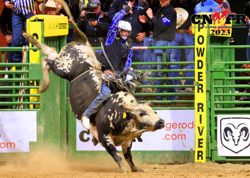 Dawson Gleavves rides a bull turning in a 80.5 on Saturday. 