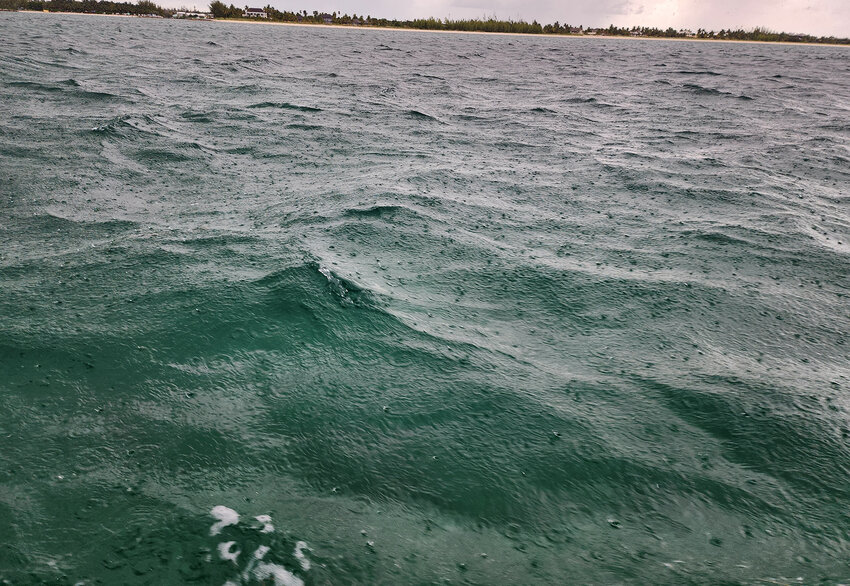A storm hits during an excursion on a glass bottom boat. Not enough to be dangerous, but enough to be wet and fun.