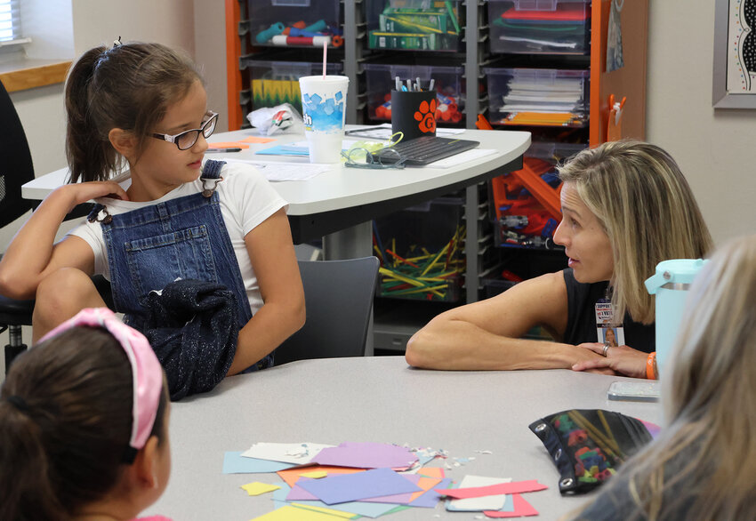 Aledo ISD Superintendent Dr. Susan Bohn joins in class activities during the first day of School at McCall Elementary School.