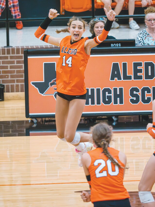 Alyssa Todd celebrates a Ladycat point during a tightly contested match versus Northwest to start District 5-5A play on Friday, Sept. 8.