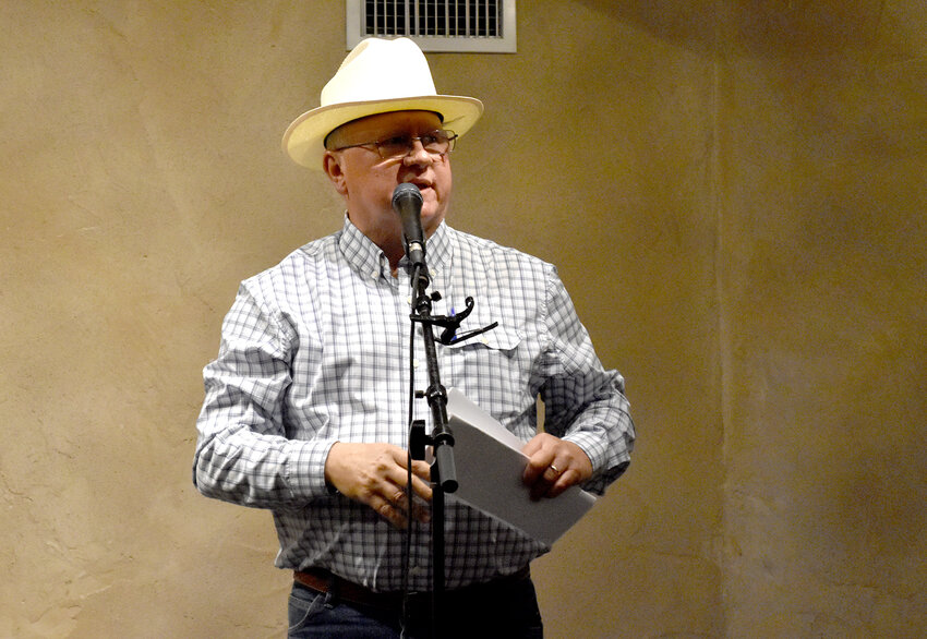 Auctioneer Ross Bandy elicited maximum bids for the live auction items.