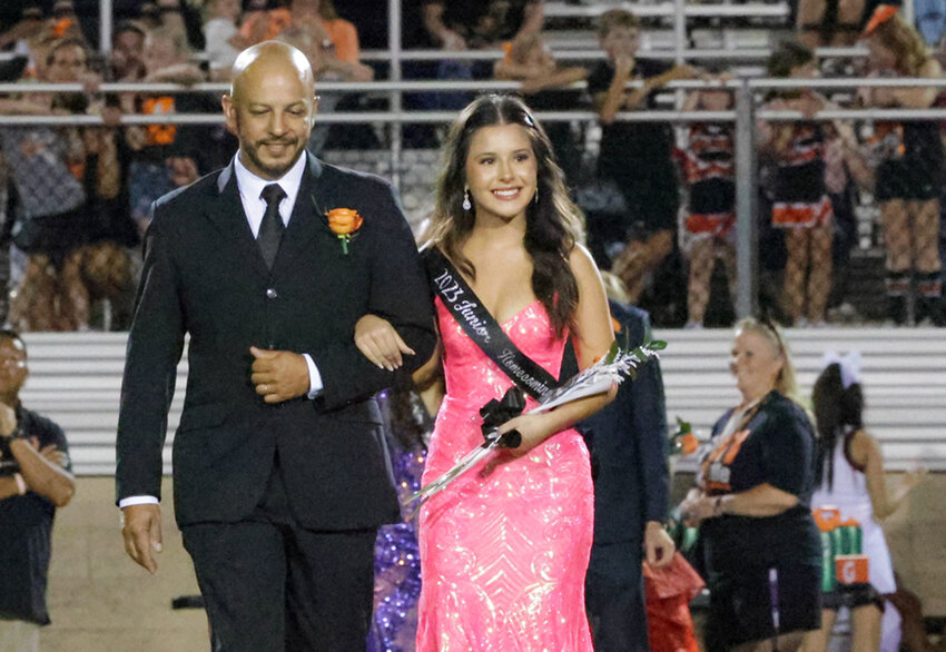Junior May Inoue was escorted by her father, Douglas Inoue.