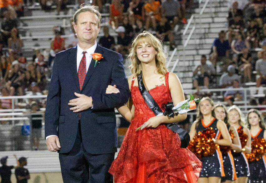 Senior Jane Claire Anderson was escorted by her father, Seth Anderson.