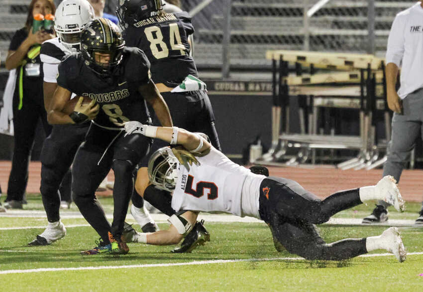 Ky Howington (5) brings down Colony wide receiver Chase Glover.