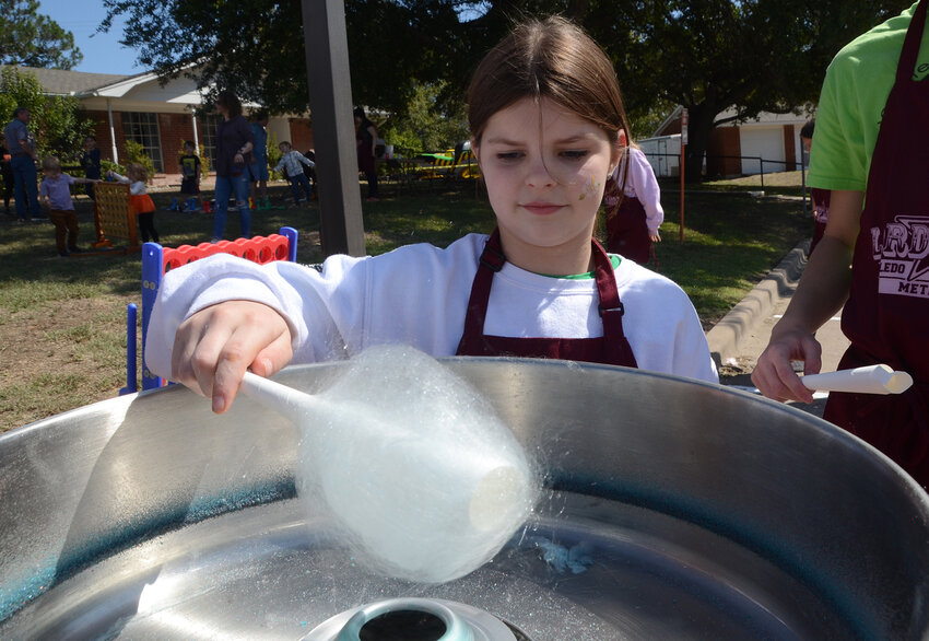 Kenzie Madewell spins delicious cotton candy.
