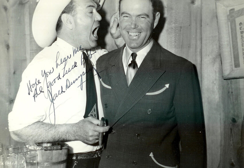 Heavyweight boxing champion Jack Dempsey and Bob Rothel enjoy a moment at the El Chico clubhouse.