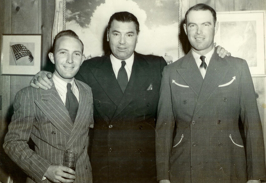 Jack Dempsey, Bob Rothel, and an unidentified person at the El Chico.