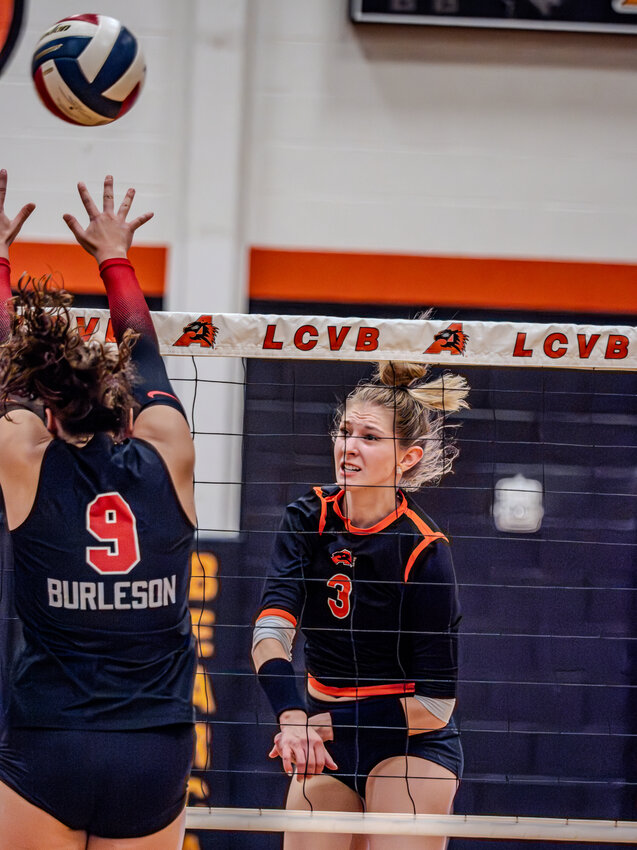 Vivian Parker admires her handiwork after she fires a shot past the Burleson defense in the final match of the regular season on Tuesday, Oct. 24.