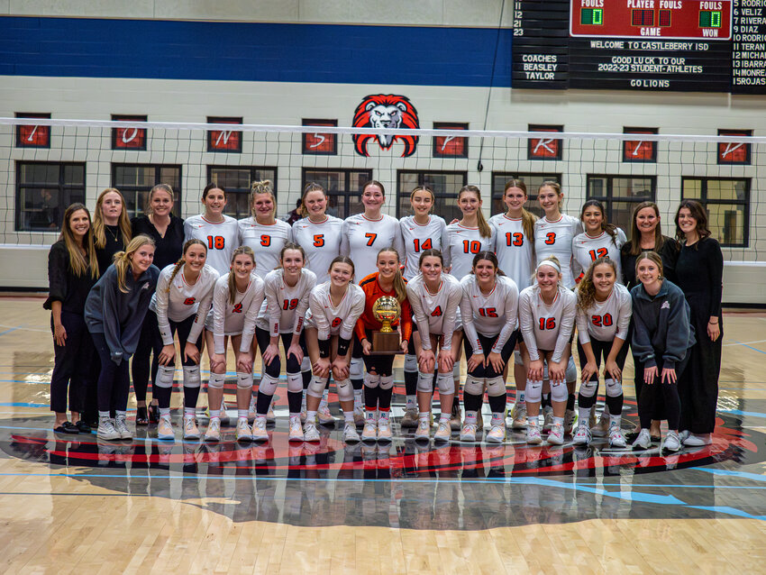 Ladycats pose with their bi-district trophy following a sweep over Northside's Lady Steers on Monday, Oct. 30.