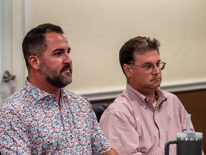 Aledo mayor, Nick Stanley, and city manager, Noah Simon, listen to presenations during a recent city council meeting.