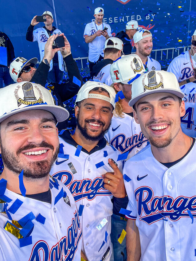 Cody Bradford poses for a selfie with his teammates during the World Series parade in Arlington on Friday, Nov. 3.