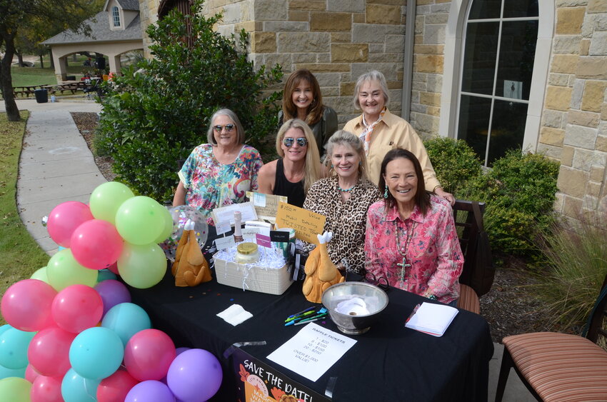 Some Shop for the Trot organizers gather at the check-in table. Sharlyn Poe, Kate Ray, Sabrina King, June King, Rhonda Ray and Marsha Annconna.