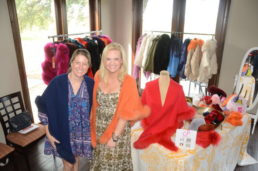 Shop owners Emily Lee of The Bow Next Door and Blair Cantrell of C&B Collections were at the benefit event.