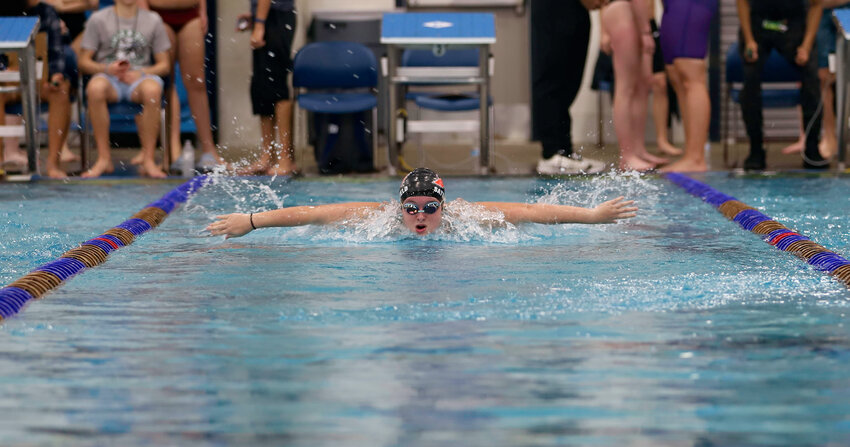 Corah Satterfield take a breath during her butterfly swim at the Non-TISC Invitational.