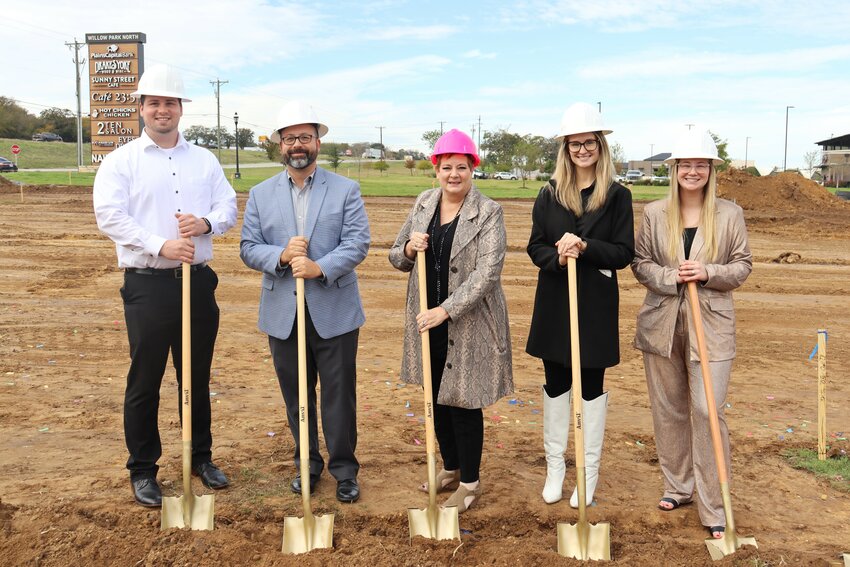 NBT Financial held a groundbreaking on Nov. 13 in The Shops at Willow Park. NBT began in north Fort Worth in 1973 and now has branches in Hurst, Burleson and Azle. Shown are Mark Swift (credit analyst), Sean Woodring (Branch President), Shawn McCage (Branch Manager), Shaylee Pierick (Personal Banker), and Jordan Forrest ( Loan Assistant). The new 5,000-square-foot facility is expected to open in August of 2024.