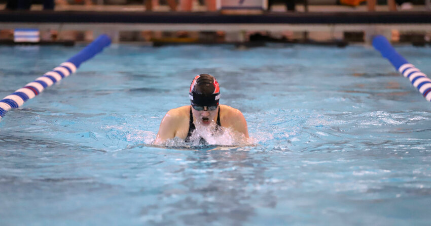 Haley Roberson take a breath during the breaststroke leg of the 200 IM. 