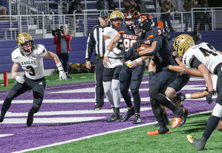 Aledo's Davhon Keys fights his way across the goal line for one of his three touchdowns against Abilene.