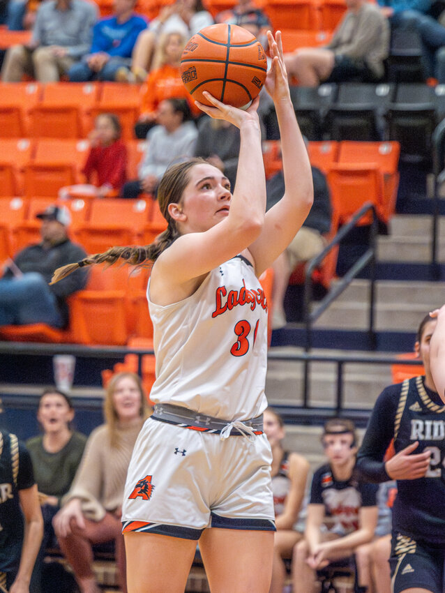 Kinley Elms knocks down a jump shot during the fourth quarter of Aledo's district opener against Wichita Falls Rider on Tuesday, Dec. 12.