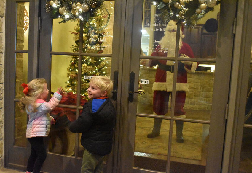 Hollis and Wyatt Minnich can't wait for Santa's appearance at the Willow Park Christmas Tree lighting on Dec. 5.